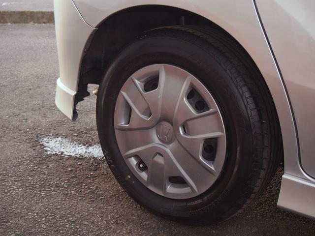 フリードハイブリッド ジャストセレクション　ＨＤＤナビ　後席モニター　バックカメラ　電動ドア　６人乗り　スマートキー　２列目キャプテンシート　右側オートクロージャードア　純正エアロ　ＨＩＤライト　ウィンカードアミラー　１セグＴＶ　ＤＶＤ　ＣＤ録音　クルコン　横滑り防止　ＥＴＣ　禁煙車（28枚目）