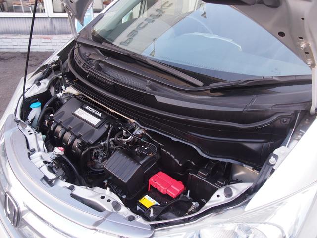 フリードハイブリッド ジャストセレクション　ＨＤＤナビ　後席モニター　バックカメラ　電動ドア　６人乗り　スマートキー　２列目キャプテンシート　右側オートクロージャードア　純正エアロ　ＨＩＤライト　ウィンカードアミラー　１セグＴＶ　ＤＶＤ　ＣＤ録音　クルコン　横滑り防止　ＥＴＣ　禁煙車（32枚目）