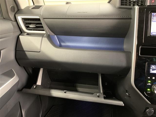 小物や取扱説明書などが収納できます。