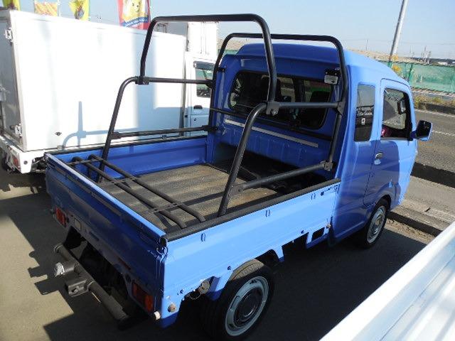 スーパーキャリイ X 三方開パートタイム4WD 衝突軽減ブレーキ ヒッチメンバー フロントグリルガード HDDナビ ワンセグ バックカメラ キーレス ETC フォグ ABS ダブルSRS オーバーヘッドコンソール(7枚目)