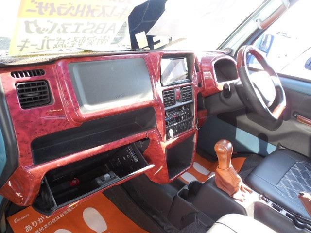 スーパーキャリイ X 三方開パートタイム4WD 衝突軽減ブレーキ ヒッチメンバー フロントグリルガード HDDナビ ワンセグ バックカメラ キーレス ETC フォグ ABS ダブルSRS オーバーヘッドコンソール(18枚目)