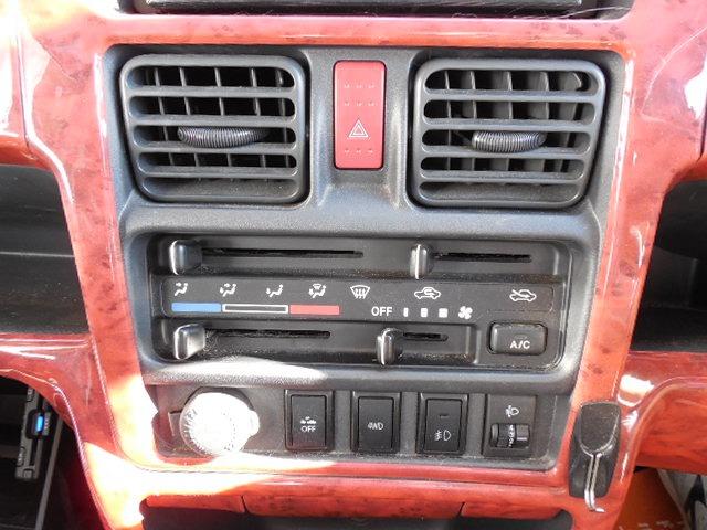 スーパーキャリイ X 三方開パートタイム4WD 衝突軽減ブレーキ ヒッチメンバー フロントグリルガード HDDナビ ワンセグ バックカメラ キーレス ETC フォグ ABS ダブルSRS オーバーヘッドコンソール(30枚目)