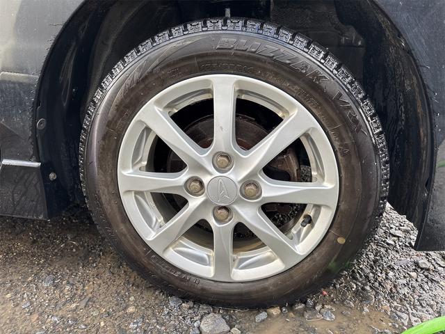 タント カスタムRS 《4WDターボ》《車検2年》《後期モデル》純正フルエアロ14インチAW/SDナビTV/MOMO革巻きステアリング/パワースライドア/スマートキー/HIDオートライトフォグ/(11枚目)