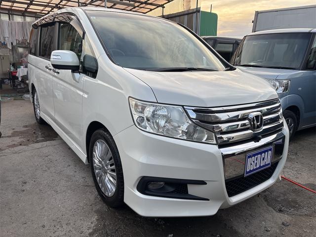 ステップワゴンスパーダ クールスピリット 《車検2年》純正ナビTVバックカメラ/全周囲カメラ/フリップダウンモニター/革巻きステアリング/スマートキ/ETC/両側パワースライドア/HIDオートライトフォグ/17インチAW/ETC/パドルシフト(4枚目)