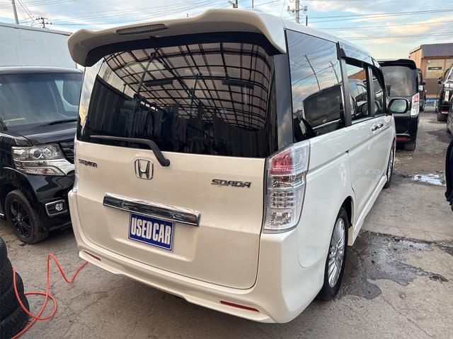 ステップワゴンスパーダ クールスピリット 《車検2年》純正ナビTVバックカメラ/全周囲カメラ/フリップダウンモニター/革巻きステアリング/スマートキ/ETC/両側パワースライドア/HIDオートライトフォグ/17インチAW/ETC/パドルシフト(6枚目)