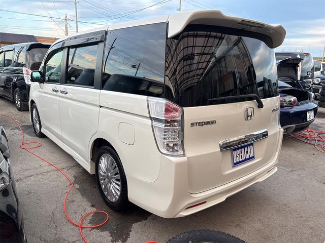 ステップワゴンスパーダ クールスピリット 《車検2年》純正ナビTVバックカメラ/全周囲カメラ/フリップダウンモニター/革巻きステアリング/スマートキ/ETC/両側パワースライドア/HIDオートライトフォグ/17インチAW/ETC/パドルシフト(7枚目)