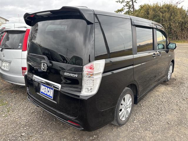 ステップワゴンスパーダ Ｚ　《４ＷＤ》純正フルエアロ１６インチＡＷ／両側パワースライドア／ＳＤナビＴＶフルセグバックカメラ／スマートキー／ＨＩＤオートライトフォグ／パドルシフト／革巻きステアリング／ＥＴＣ／オートエアコン／８人乗（6枚目）