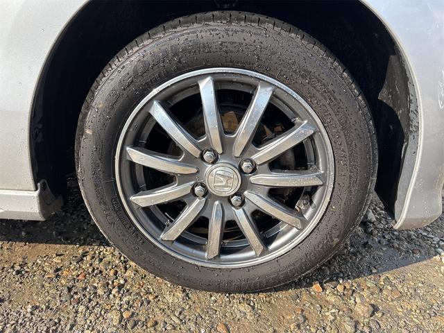 Ｎ－ＷＧＮカスタム Ｇ・ターボパッケージ　《ターボ》《車検２年》純正フルエアロ１４インチＡＷ／純正ナビＴＶ／Ｂｌｕｅｔｏｏｔｈハーフレザーシート／革巻きステアリング／プッシュスタート／スマートキー／ＥＴＣ／ＨＩＤオートライトフォグ／（12枚目）