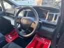Z 《車検2年》純正フルエアロ16インチAW/スマートキー/オートエアコン/両側パワースライドドア/革巻きステアリング/8人乗り/HIDオートライトフォグ/ETC/パドルシフト/スペアキー付き(13枚目)