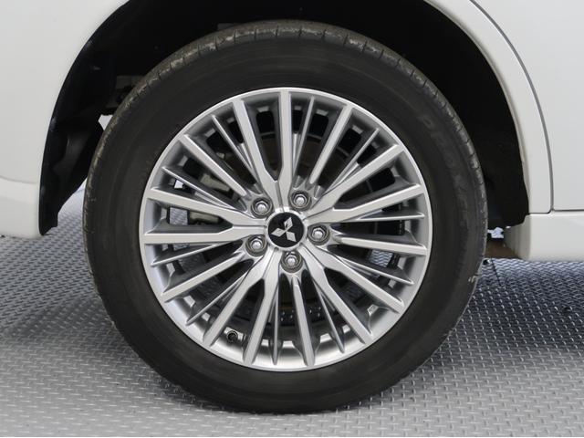 アウトランダーＰＨＥＶ Ｇ　禁煙　電気温水式ヒーター　後側方車両検知　ナビ　後席モニター　ワンオーナー　駆動用バッテリー容量残７８％　シートハンドルヒーター　パワーシート　オートマチックハイビーム　ＡＣ１００Ｖ電源１５００Ｗ給電（67枚目）