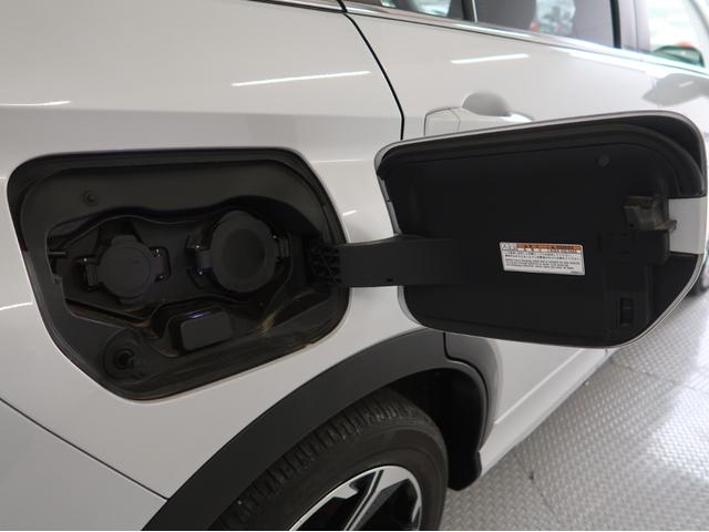エクリプスクロスＰＨＥＶ Ｇ　禁煙　残存８９　ワンオ－ナ－　純正ナビ　リヤカメラ　電動ブレーキ（オートホールド）　レーダークルーズコントロール　前席シートヒーター　ハンドルヒーター　１５００Ｗ給電ＡＣ１００Ｖ電源　オートハイビーム（56枚目）
