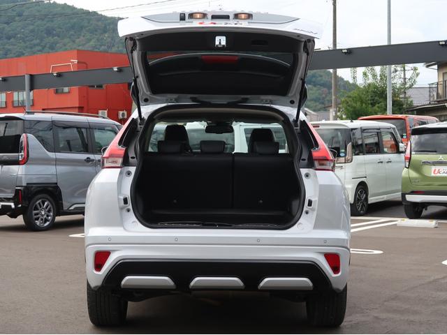 エクリプスクロスＰＨＥＶ Ｇ　禁煙　残存８９　ワンオ－ナ－　純正ナビ　リヤカメラ　電動ブレーキ（オートホールド）　レーダークルーズコントロール　前席シートヒーター　ハンドルヒーター　１５００Ｗ給電ＡＣ１００Ｖ電源　オートハイビーム（64枚目）