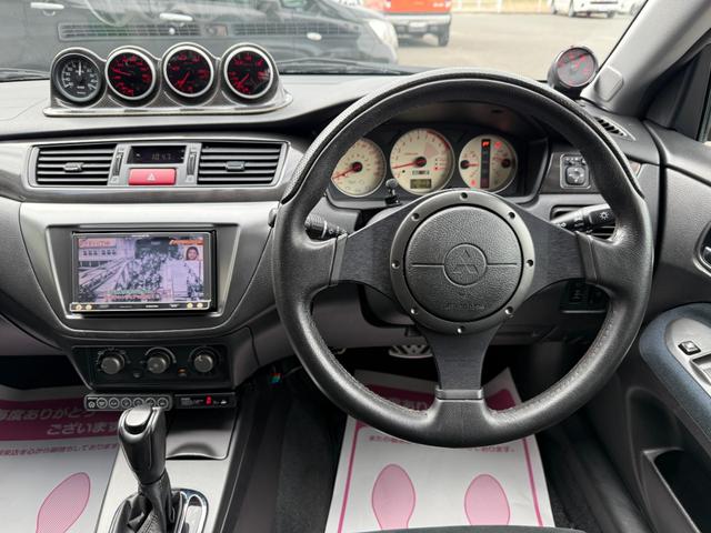 ランサーワゴン エボリューションＧＴ－Ａ　ラリーアート製３００ｋｍメーター　走行４ｋｍ時ディーラーメーター交換記録あり　純正レカロシート　ブレンボキャリパー　ＨＩＤヘッドランプ　エンケイ製１７ＡＷ　追加メーター　ＨＫＳ製マフラー　取扱説明書（2枚目）