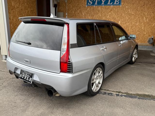 ランサーワゴン エボリューションＧＴ－Ａ　ラリーアート製３００ｋｍメーター　走行４ｋｍ時ディーラーメーター交換記録あり　純正レカロシート　ブレンボキャリパー　ＨＩＤヘッドランプ　エンケイ製１７ＡＷ　追加メーター　ＨＫＳ製マフラー　取扱説明書（6枚目）