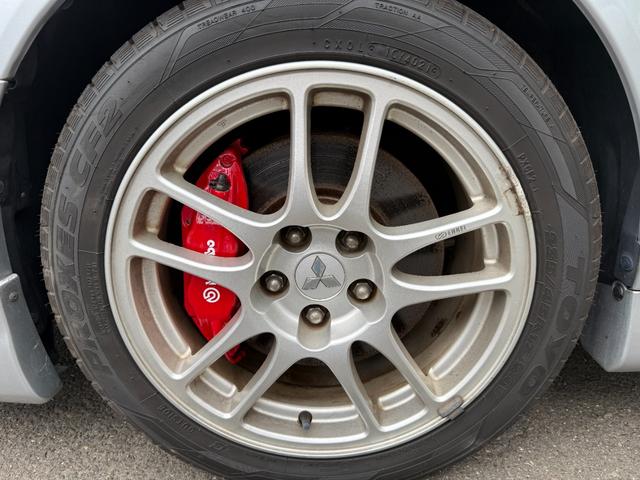 ランサーワゴン エボリューションＧＴ－Ａ　ラリーアート製３００ｋｍメーター　走行４ｋｍ時ディーラーメーター交換記録あり　純正レカロシート　ブレンボキャリパー　ＨＩＤヘッドランプ　エンケイ製１７ＡＷ　追加メーター　ＨＫＳ製マフラー　取扱説明書（65枚目）