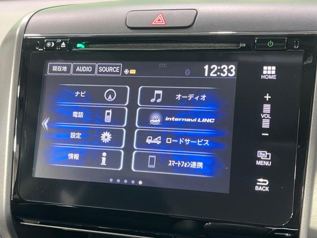 フリード Ｇ・ホンダセンシング　禁煙車　純正ナビ　両側パワスラ　衝突軽減装置　レーダークルーズ　寒冷地仕様　バックカメラ　ＥＴＣ　Ｂｌｕｅｔｏｏｔｈ　ＬＥＤヘッド　車線逸脱祖警報　スマートキー　革巻ステアリング　ロールサンシェード（22枚目）
