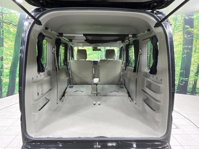 ＮＶ１００クリッパーリオ Ｇ　禁煙車　４ＷＤ　ターボ　両側電動スライドドア　純正ナビ　バックカメラ　衝突軽減装置　シートヒーター　ＨＩＤヘッド　ＥＴＣ　オートライト　オートエアコン　ＣＤ／ＤＶＤ再生　Ｂｌｕｅｔｏｏｔｈ（11枚目）