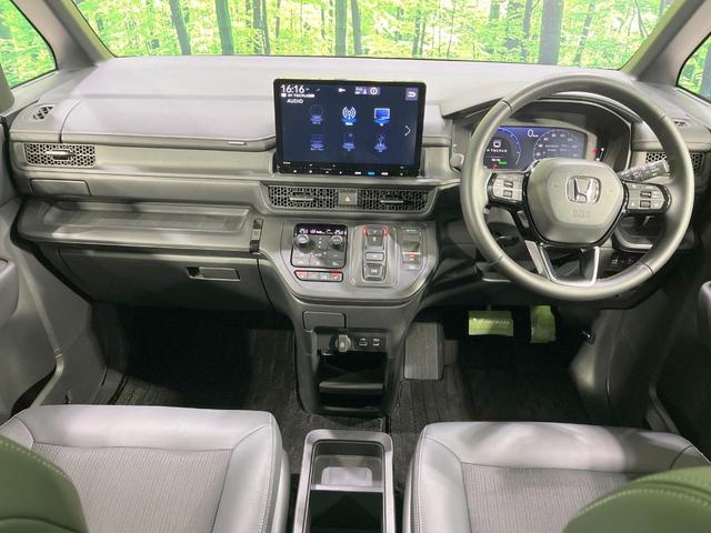 ステップワゴン e:HEVスパーダ 禁煙車 衝突軽減装置 後席モニター 純正11型ナビ 両側電動スライド バックカメラ レーダークルーズ LEDヘッド ETC ドラレコ ブラインドスポットモニター ハーフレザーシート(2枚目)