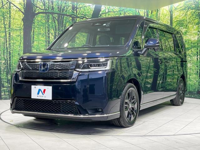ステップワゴン e:HEVスパーダ 禁煙車 衝突軽減装置 後席モニター 純正11型ナビ 両側電動スライド バックカメラ レーダークルーズ LEDヘッド ETC ドラレコ ブラインドスポットモニター ハーフレザーシート(62枚目)