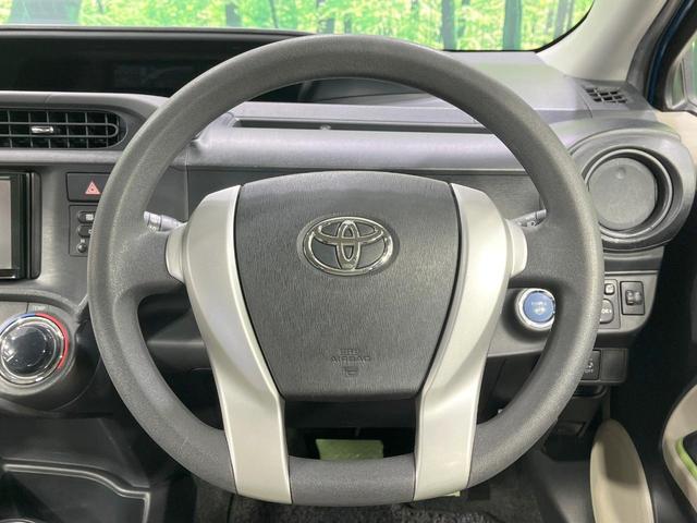 アクア S 禁煙車 SDナビ ETC 寒冷地仕様 オートエアコン スマートキー CD再生 オートライト 盗難防止システム 電動格納ミラー プライバシーガラス 横滑り防止(11枚目)