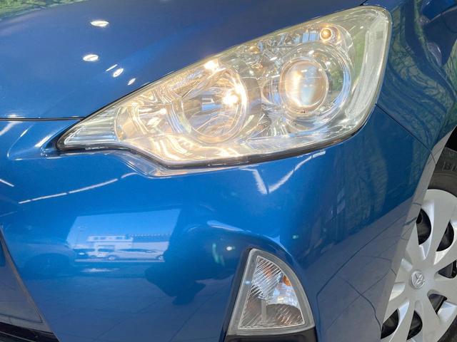 アクア S 禁煙車 SDナビ ETC 寒冷地仕様 オートエアコン スマートキー CD再生 オートライト 盗難防止システム 電動格納ミラー プライバシーガラス 横滑り防止(12枚目)