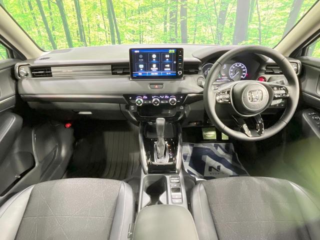 ヴェゼル e:HEV Z 禁煙車 4WD 寒冷地仕様 純正9型ナビ バックカメラ 衝突軽減 レーダークルーズ 電動リアゲート シートヒーター ハーフレザーシート ドラレコ ETC コーナーセンサー スマートキー LEDヘッド(2枚目)