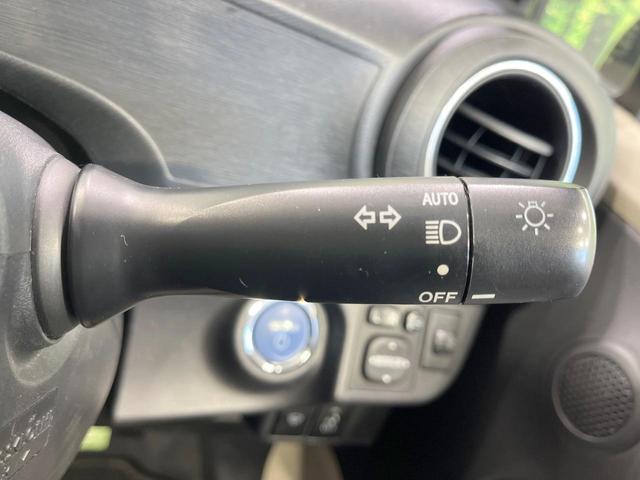 アクア G 禁煙車 寒冷地仕様 スマートキー オートライト 純正15インチアルミ CD パワーウインドウ パワーステアリング 電動格納ミラー オートエアコン(4枚目)