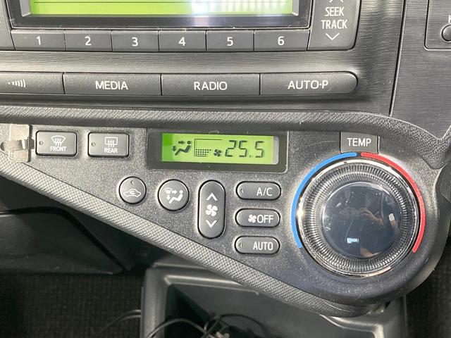 アクア G 禁煙車 寒冷地仕様 スマートキー オートライト 純正15インチアルミ CD パワーウインドウ パワーステアリング 電動格納ミラー オートエアコン(7枚目)