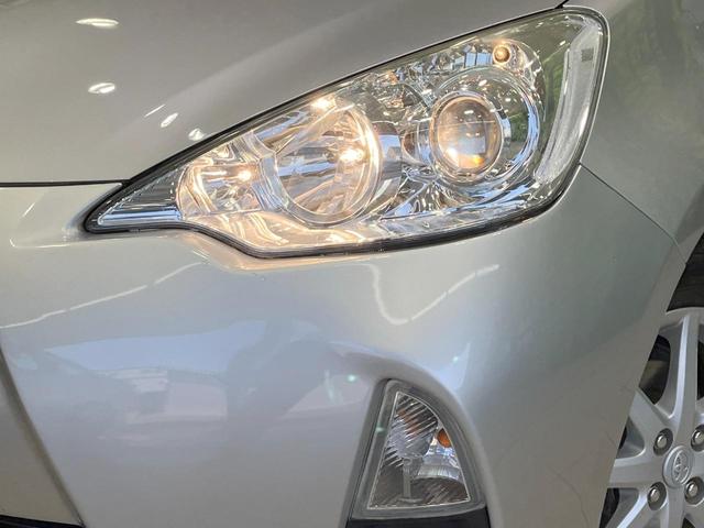 アクア G 禁煙車 寒冷地仕様 スマートキー オートライト 純正15インチアルミ CD パワーウインドウ パワーステアリング 電動格納ミラー オートエアコン(12枚目)