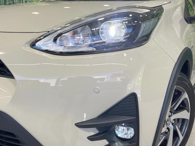 アクア クロスオーバー 禁煙車 純正9型ナビ バックカメラ 衝突軽減装置 レザーシート コーナーセンサー スマートキー LEDヘッド ETC オートハイビーム 車線逸脱警報 オートライト オートエアコン 純正16インチAW(12枚目)