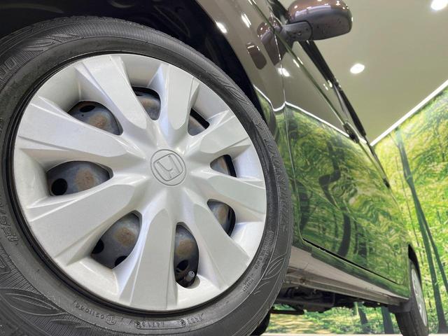 N-WGN G 禁煙車 4WD スマートキー 前席シートヒーター アイドリングストップ オートエアコン CD 電動格納ミラー プライバシーガラス 盗難防止装置 横滑り防止機能 ドアバイザー 衝突安全ボディ(13枚目)