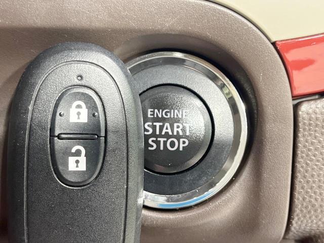 アルトラパンショコラ X 禁煙車 4WD シートヒーター スマートキー HIDヘッド オートエアコン 純正14インチアルミ CD再生 合皮シート アイドリングストップ 電動格納ミラー 盗難防止装置 プライバシーガラス(4枚目)