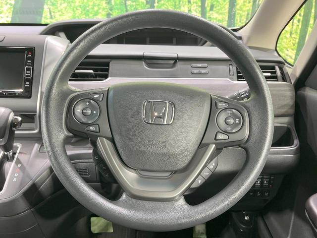 フリード Ｇブラックスタイル　４ＷＤ　純正ナビ　衝突軽減装置　両側電動スライド　レーダークルーズ　フルセグ　ＬＥＤヘッド　Ｂｌｕｅｔｏｏｔｈ再生　純正１５インチアルミ　オートライト　オートエアコン　ＤＶＤ／ＣＤ再生（12枚目）