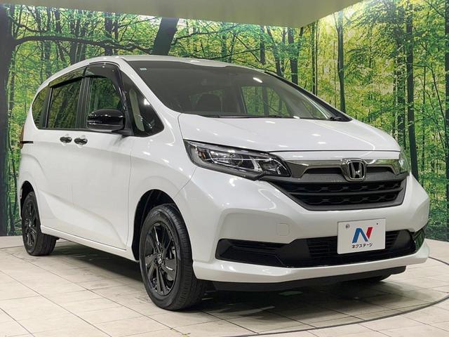 フリード Ｇブラックスタイル　４ＷＤ　純正ナビ　衝突軽減装置　両側電動スライド　レーダークルーズ　フルセグ　ＬＥＤヘッド　Ｂｌｕｅｔｏｏｔｈ再生　純正１５インチアルミ　オートライト　オートエアコン　ＤＶＤ／ＣＤ再生（17枚目）