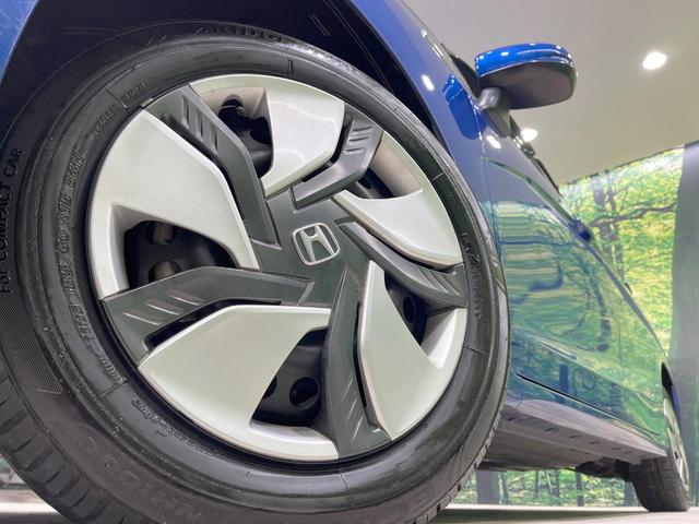 フィットハイブリッド Ｌパッケージ　禁煙車　純正ナビ　バックカメラ　衝突軽減装置　ドラレコ　ＥＴＣスマートキー　ＬＥＤヘッドライト　クルコン　オートライト　ハーフレザー　オートエアコン　Ｂｌｕｅｔｏｏｔｈ　ＣＤ／ＤＶＤ再生（13枚目）