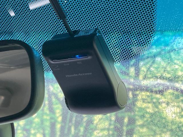 フィットハイブリッド Ｌパッケージ　禁煙車　純正ナビ　バックカメラ　衝突軽減装置　ドラレコ　ＥＴＣスマートキー　ＬＥＤヘッドライト　クルコン　オートライト　ハーフレザー　オートエアコン　Ｂｌｕｅｔｏｏｔｈ　ＣＤ／ＤＶＤ再生（30枚目）