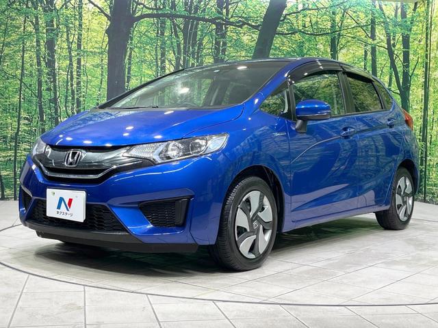 フィットハイブリッド Ｌパッケージ　禁煙車　純正ナビ　バックカメラ　衝突軽減装置　ドラレコ　ＥＴＣスマートキー　ＬＥＤヘッドライト　クルコン　オートライト　ハーフレザー　オートエアコン　Ｂｌｕｅｔｏｏｔｈ　ＣＤ／ＤＶＤ再生（53枚目）
