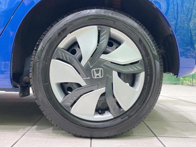 フィットハイブリッド Ｌパッケージ　禁煙車　純正ナビ　バックカメラ　衝突軽減装置　ドラレコ　ＥＴＣスマートキー　ＬＥＤヘッドライト　クルコン　オートライト　ハーフレザー　オートエアコン　Ｂｌｕｅｔｏｏｔｈ　ＣＤ／ＤＶＤ再生（57枚目）