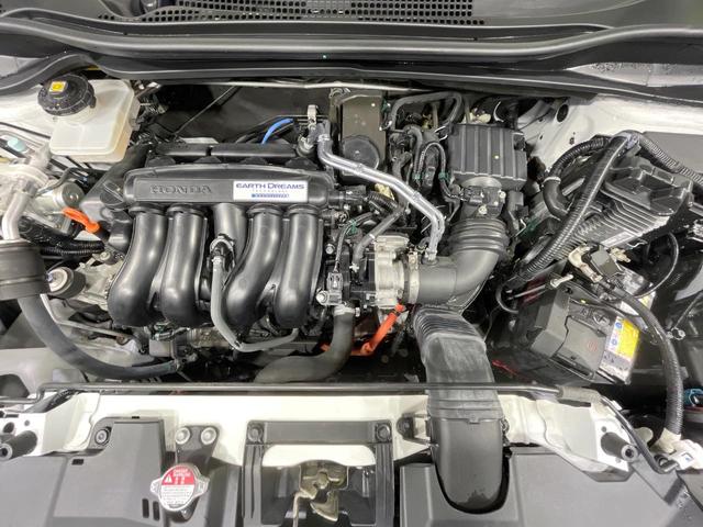 ヴェゼル ＨＶ　Ｘ・ホンダセンシングブリリアントスタイルＥＤ　禁煙車　純正ナビ　バックカメラ　衝突被害軽減システム　レーダークルーズ　ドラレコ　スマートキー　ＬＥＤヘッド　ＥＴＣ　純正１７インチアルミ　オートライト　デュアルエアコン　Ｂｌｕｅｔｏｏｔｈ　ＣＤ（18枚目）