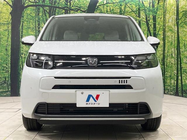 フリード エアー　４ＷＤ　登録済未使用車　衝突軽減装置　純正８型ディスプレイオーディオ　バックカメラ　両側電動スライド　レーダークルーズ　寒冷地仕様　ＬＥＤヘッド　前席シートヒーター　スマートキー　オートライト（15枚目）