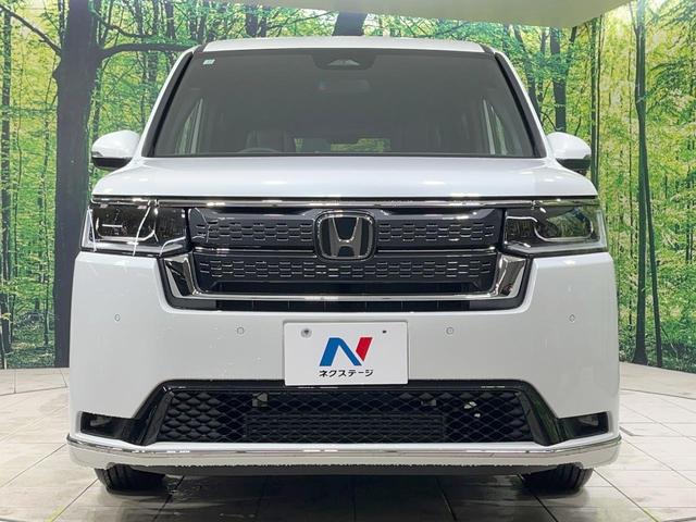 ステップワゴン スパーダ　登録済未使用車　衝突軽減装置　純正１１．４型ナビ　バックカメラ　両側電動スライド　レーダークルーズ　前席シートヒーター　スマートキー　パドルシフト　パワーバックドア　オートライト　オートエアコン（15枚目）