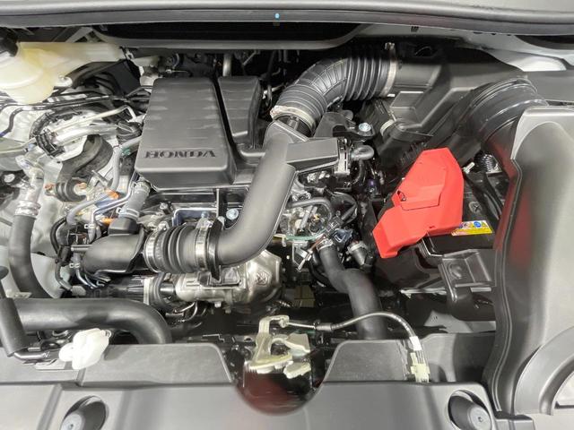 ステップワゴン スパーダ　登録済未使用車　衝突軽減装置　純正１１．４型ナビ　バックカメラ　両側電動スライド　レーダークルーズ　前席シートヒーター　スマートキー　パドルシフト　パワーバックドア　オートライト　オートエアコン（18枚目）