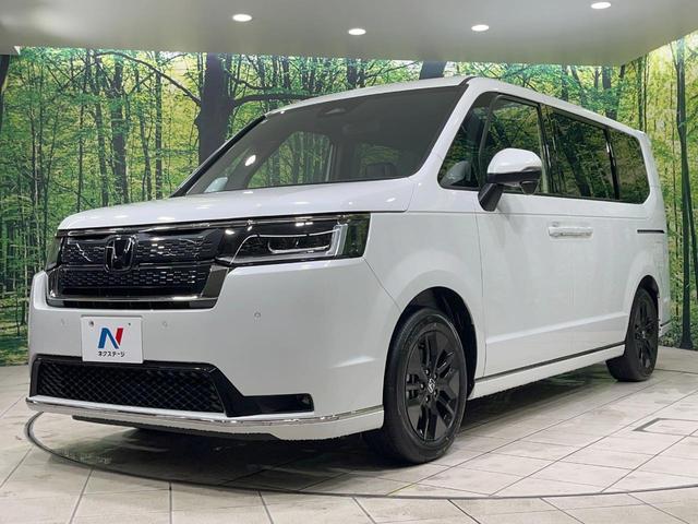 ステップワゴン スパーダ　登録済未使用車　衝突軽減装置　純正１１．４型ナビ　バックカメラ　両側電動スライド　レーダークルーズ　前席シートヒーター　スマートキー　パドルシフト　パワーバックドア　オートライト　オートエアコン（53枚目）