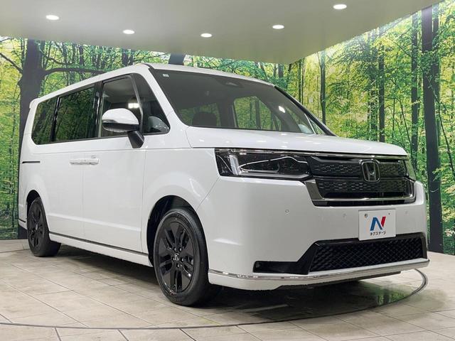 ステップワゴン スパーダ　登録済未使用車　衝突軽減装置　純正１１．４型ナビ　バックカメラ　両側電動スライド　レーダークルーズ　前席シートヒーター　スマートキー　パドルシフト　パワーバックドア　オートライト　オートエアコン（54枚目）