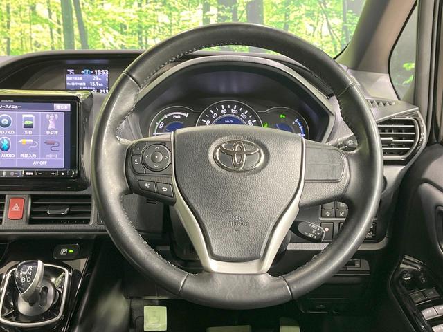 ノア ハイブリッドＳｉ　ダブルバイビーＩＩ　禁煙車　衝突軽減装置　後席モニター　ＢＩＧ－Ｘ９型ナビ　バックカメラ　両側電動スライド　ハーフレザーシート　前席シートヒーター　ＬＥＤヘッド　スマートキー　ドラレコ　ＥＴＣ　リアオートエアコン（12枚目）