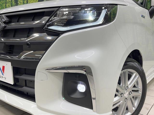 ソリオ ハイブリッドＭＺ　登録済未使用車　衝突軽減装置　純正９型ナビ　全周囲カメラ　レーダークルーズ　両側電動スライド　コーナーセンサー　ＬＥＤヘッド　ブラインドスポットモニター　ＣＤ　ＤＶＤ　シートヒーター（12枚目）