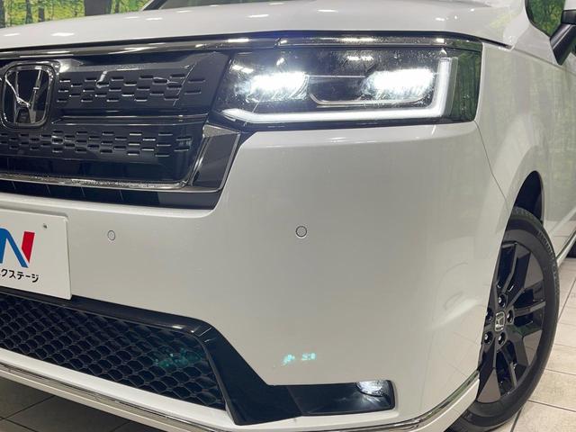 ステップワゴン スパーダ　登録済未使用車　４ＷＤ　衝突軽減装置　純正１１．４型ナビ　バックカメラ　レーダークルーズ　両側電動スライド　スマートキー　ブラインドスポットモニター　パワーバックドア　パドルシフト（13枚目）