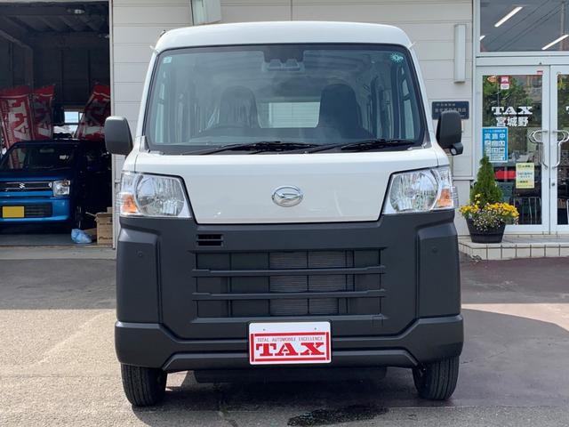 ハイゼットカーゴ スペシャル　ＡＴ　切替４ＷＤ　／届出済未使用車／衝突被害軽減ブレーキ／前後クリアランスソナー／純正ラジオ／両側手動スライドドア／オートライト／運転席助手席パワーウィンドウ／リアワイパー／荷室ライト（18枚目）