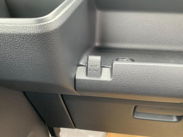ハイゼットカーゴ スペシャル　ＡＴ　切替４ＷＤ　／届出済未使用車／衝突被害軽減ブレーキ／前後クリアランスソナー／純正ラジオ／両側手動スライドドア／オートライト／運転席助手席パワーウィンドウ／リアワイパー／荷室ライト（32枚目）