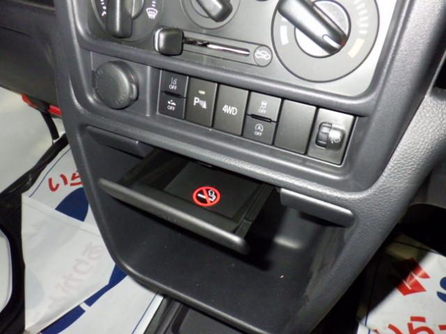 キャリイトラック ＫＣエアコン・パワステ　７型　パートタイム４ＷＤ　ＡＴシフト　スピーカー内蔵ラジオ　オートライト　４ＷＤ　衝突被害軽減システム　アイドリングストップ　アイドリングストップ　横滑り防止機能　盗難防止システム（15枚目）